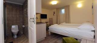 Гостевой дом KUBU Guest House Клайпеда Двухместный номер с 1 кроватью или 2 отдельными кроватями - Цокольный этаж-5